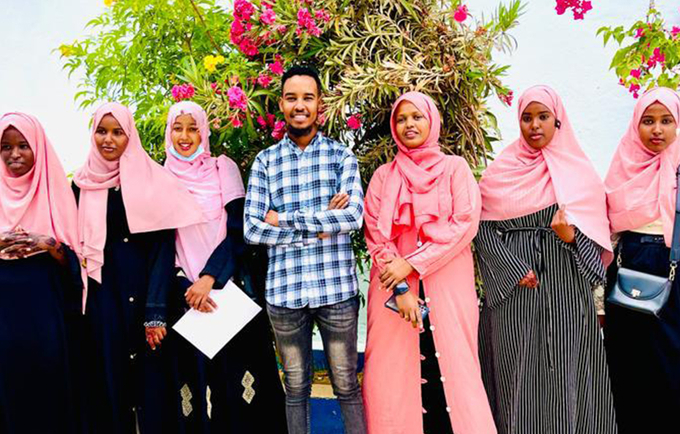 Hamda (2nd left) poses with her course mates