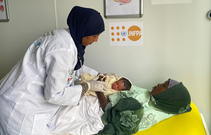 Ubah, attended to by Daynile MMC skilled midwife, with her newborn baby