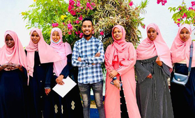 Hamda (2nd left) poses with her course mates