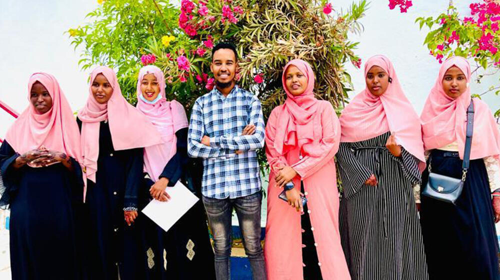 Hamda (2nd left) poses with her course mates