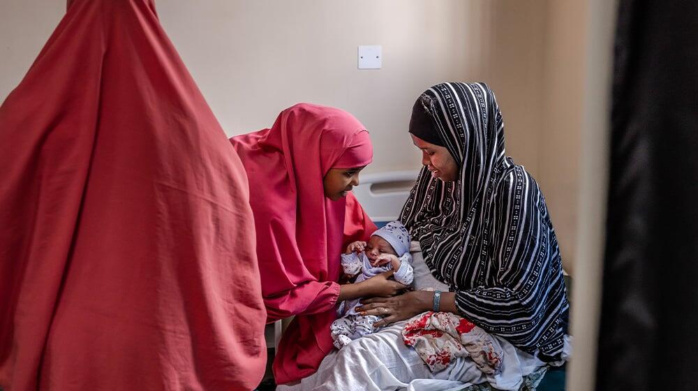 UNFPA trained midwife with a newborn baby at Banadir Hospital, Mogadishu