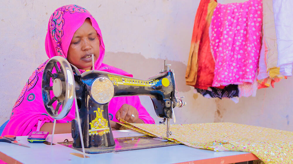 Maryan working on her sewing machine